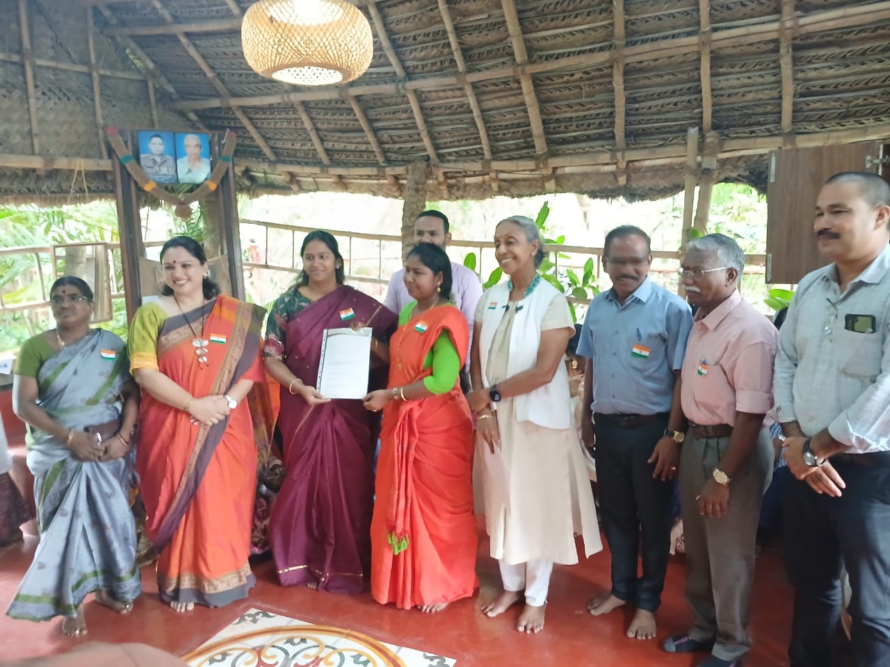Lion Dates Director Abinaya Ponnudurai hands over the CSR sanction letter at EPIC SS Padur, with Shantha Sheela Nair IAS looking on