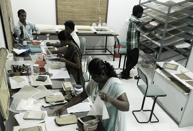 Specialists working inside RMRL conservation studio